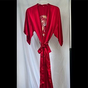 Red silk robe with a dragon on the back